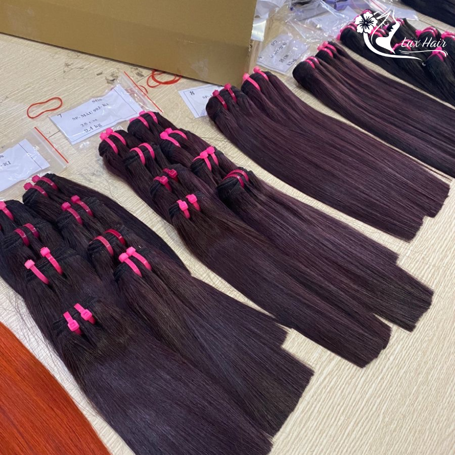 lose-up of Lux Hair dark wine bone straight weave